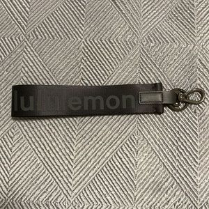 lululemon black never lost keychain